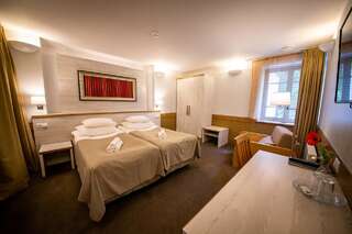 Отель Hotel Liilia Кайна Улучшенный двухместный номер с 1 кроватью или 2 отдельными кроватями-1